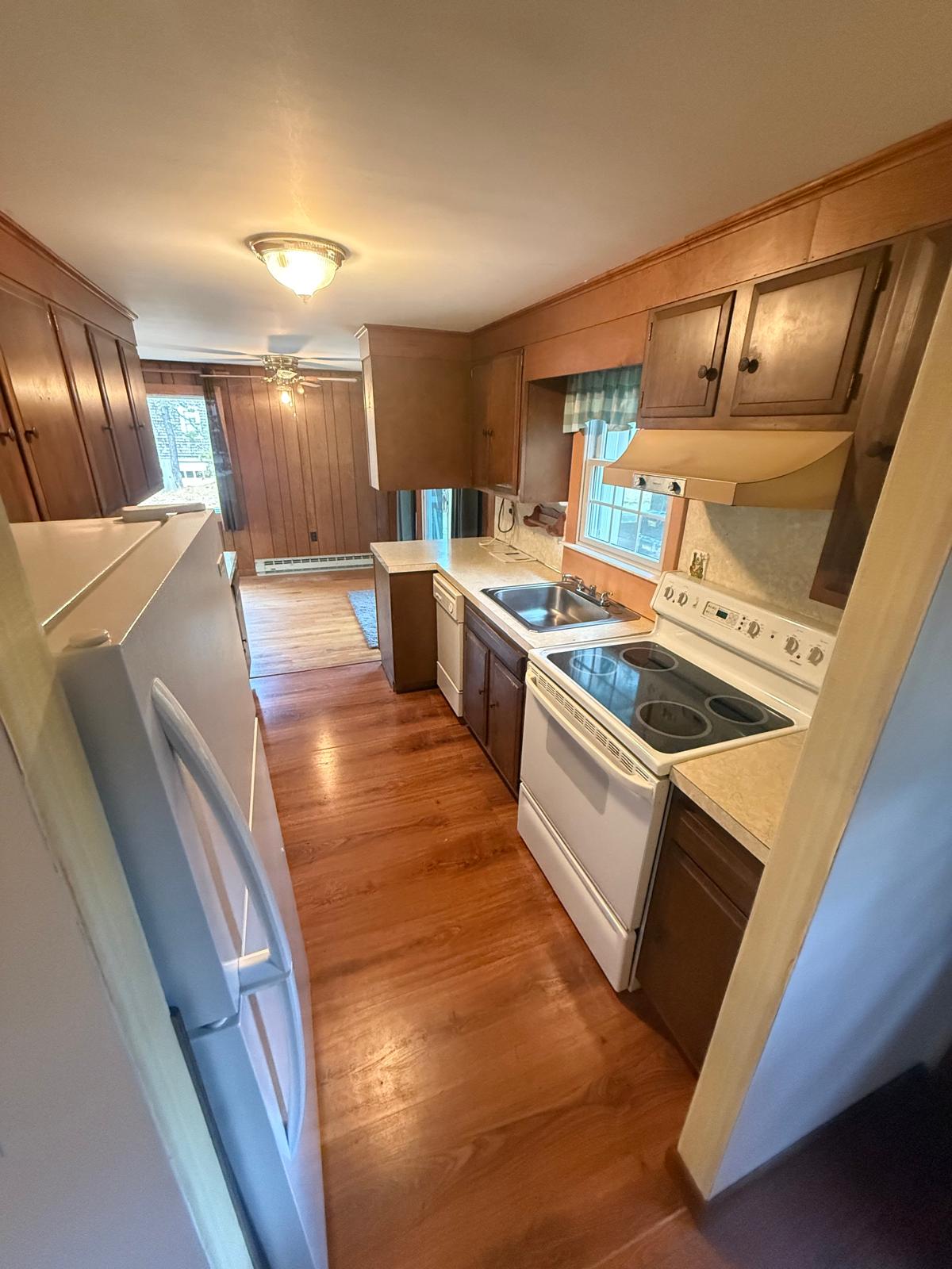 Original galley kitchen before Estevam Finish Carpentry remodel