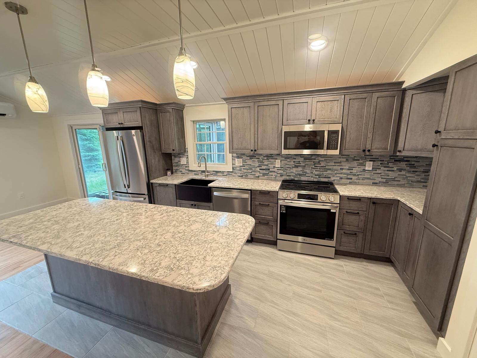 Custom kitchen remodel with vaulted shiplap ceiling and quartz island — Massachusetts